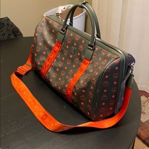 Brand new mcm duffle bag exclusive color.